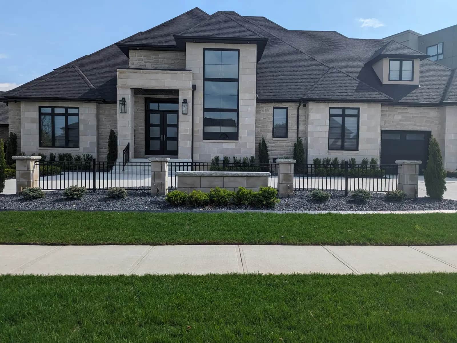 Professional cement curbing and landscaping transformation in Essex County Ontario by Extreme Curbing and Landscaping